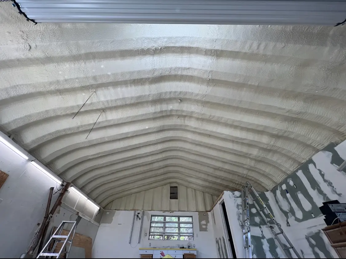 Spray polyurethane foam applied to the underside of a metal roof deck in North Middleton